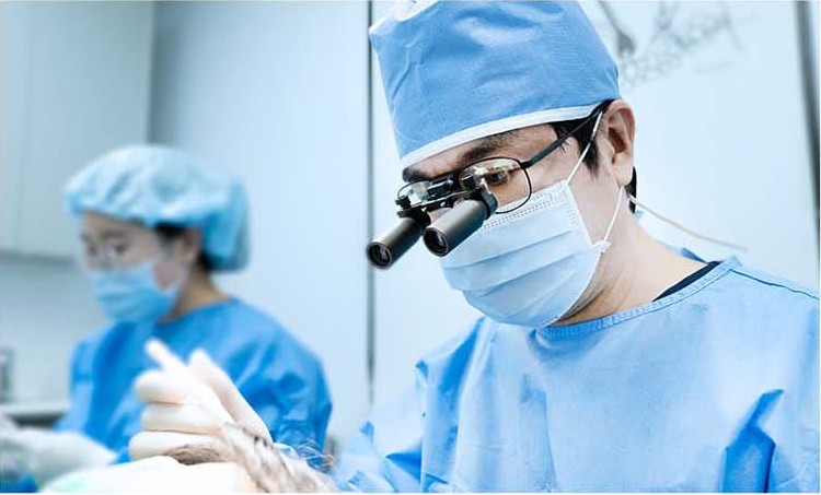 MOJELIM medical staff and surgical team wearing loupes